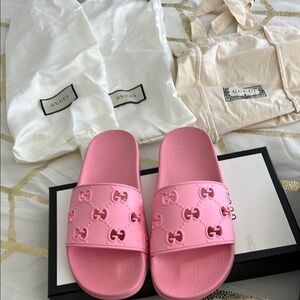Gucci Pink Embossed Logo Slides